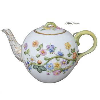 Teapot with flower applications